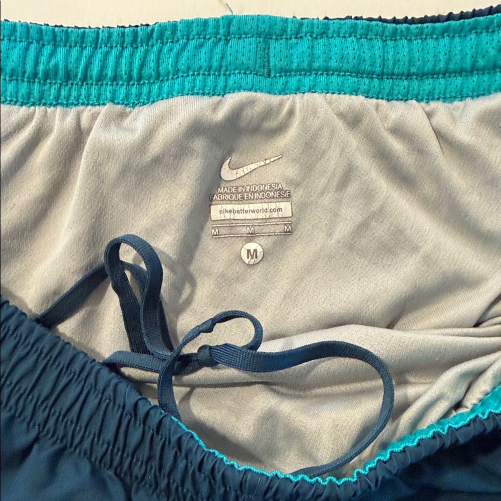 Nike Women's Dark Navy Athletic Shorts with Teal Panels and Neon Yellow Trim - Picture 4 of 5